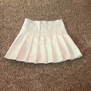 white pleated skirt